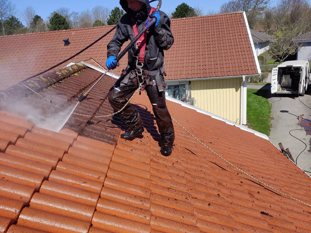PEMAB's team working on roof maintenance